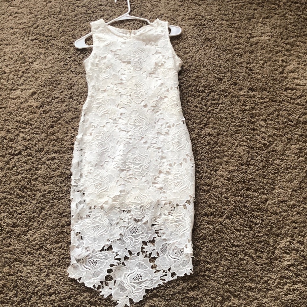 Sleeveless white lace dress